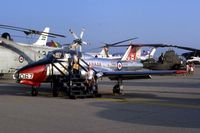 114067 @ DAY - CT-114 Tutor at the Dayton International Air Show.  Those are my kids on the steps - by Glenn E. Chatfield