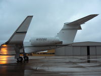N102BG @ GKY - On the ramp at Arlington Municipal...in the cold rain