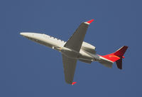N401LJ @ KSNA - Learjet 45 Blasting off on a gorgeous day. - by Mike Khansa