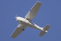 N5182A @ KSNA - Cessna 172R climbing the blue sky. - by Mike Khansa