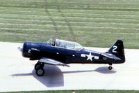 N9789Z @ DPA - Harvard Mk.2 AJ731, ex-AT-6C, Taxiing by the control tower - by Glenn E. Chatfield