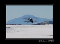 N28KT @ KAPA - Power Play landing on 17L with Pikes Peak in the background. - by Bluedharma