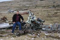 AE521 - This is me sitting on the wreck of BV Chinook CH-47C of the Argentine AF located at the foot of Mount Kent, Falkland Island. This aircraft was destroyed during the 1982 Falklands Conflict. Notice the snow on the ground - yes a cold Spring November day - by Steve Staunton