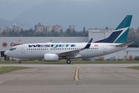 C-FEWJ @ CYVR - Wsetjet 737-700 - by Andy Graf-VAP