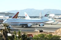 A6-MMM @ LAX - Parked near sister ship A6-HRM - by Damon J. Duran