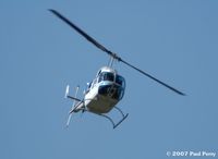 N1071A @ SFQ - Breaking overhead for landing - by Paul Perry