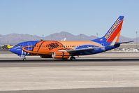 N224WN @ LAS - Southwest Airlines Slam Dunk ONE N224WN (FLT SWA1011) from Lambert-St. Louis Int'l (KSTL) landing on RWY 25L. - by Dean Heald