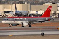 N353NB @ LAX - Northwest Airlines N353NB (FLT NWA315) from Minneapolis/St Paul Int'l (KMSP) on high-speed taxiway after landing on RWY 25L. - by Dean Heald