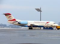 OE-LFI @ LOWS - Austrian Arrows Fokker 70 awaits its first trip of the day from Salzburg - by Terry Fletcher