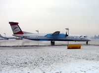 OE-LGI @ LOWS - Austrian Arrows Dash 8 leaves the main salzburg ramp - by Terry Fletcher