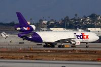 N527FE @ LAX - FedEx N527FE taxiing to the maintenance hangar. - by Dean Heald
