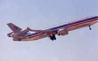 N592FE @ DFW - Formerly N1760A - Take off at DFW - Ahh the joys of shooting film... - by Zane Adams