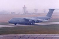 70-0449 @ CID - C-5A landing Runway 9 in fog and low ceilings at dawn. - by Glenn E. Chatfield