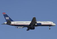 N905AW @ KSNA - US Airways A320 on short final. - by Mike Khansa