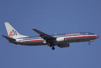 N958AN @ KSNA - American Arlines Boeing 737-823 on short final. - by Mike Khansa