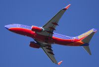 N294WN @ KSNA - Southwest B737-7H4 lifting off on a gorgeous day. - by Mike Khansa