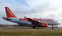 G-EZEV @ EGGW - Easyjet A319 taxies out for its flight from Luton to Edinburgh - by Terry Fletcher