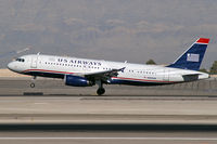 N665AW @ KLAS - US Airways / 2001 Airbus Industrie A320-232 / This landing prompted all McCarran's Emergency Vehicles to stand-by. No mishap occured. - by Brad Campbell