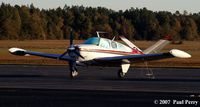 N6409S @ SFQ - Nice time of day to frame up a visitor - by Paul Perry