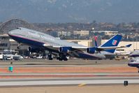 N107UA @ LAX - United Airlines N107UA (FLT UAL891) departing RWY 25R enroute to Narita Int'l (RJAA). - by Dean Heald