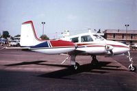 UNKNOWN @ DPA - Photo taken for aircraft recognition training.   Cessna 310B passing through.  Nice paint job.