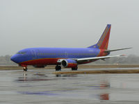 N378SW @ DAL - Southwest Airlines - In the rain at Love Field, Dallas, TX - by Zane Adams