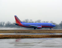 N614SW @ DAL - Southwest Airlines - Takeoff in the rain at Love Field, Dallas, TX - by Zane Adams