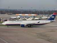 N274AY @ EGCC - US Airways A330 taxies out for its flight from Manchester to Philadelphia - by Terry Fletcher