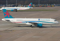 G-OOAW @ EGCC - First Choice A320 taxies onto stand in Feb 2008 - by Terry Fletcher