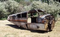 N7850Y @ I19 - N7850Y Twin Comanche, remains at Greene County OH in 1994 - by Pete Hughes