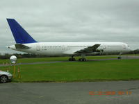 G-FJEB @ EGHL - Boeing 757 in storage at Lasham, England. Previous reg N290AN. Note engines removed - by John J. Boling
