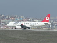 TC-JPD @ LTBA - Turkish A320 holding short at Istanbul, Turkey - by John J. Boling