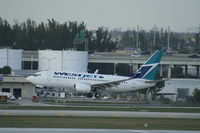 C-FWSV @ KFLL - Boeing 737-700 - by Mark Pasqualino