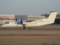 B-15227 @ CYYC - Ex Uni Air DHC-8 seen being serviced in Calgary - by CdnAvSpotter