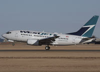 C-GXWJ @ CYYC - Inches from touching down on Rwy 34 - by CdnAvSpotter