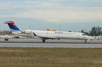 N369CA @ MIA - Comair / Delta Connection CRJ about to depart Miami - by Terry Fletcher