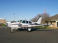 N2064C @ KIER - On the ramp with the sun setting - by Chance Thigpen