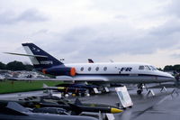 N909FR @ EGLF - N909FR at Farnborough surrounded by some garbage. - by Henk van Capelle