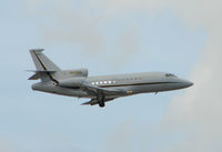 N64BD @ PBI - Falcon 900 climbs out of West Palm Beach - by Terry Fletcher