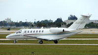 N320BP @ PBI - The business aircraft traffic at West Palm Beach on the Friday before President's Day always provides the aviation enthusiast / photographer with a treat - by Terry Fletcher