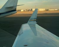 C-GSUW @ CYYC - looking out at the rightside wing - by Skylar Gebert