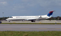 N854MJ @ FLL - Delta Connection Embraer 145 awaits departure from FLL - by Terry Fletcher