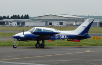 G-BBXL @ EGBJ - A visitor to Gloucestershire Airport on the day of the horse racing Gold Cup  at the nearby Cheltenham Racecourse - by Terry Fletcher