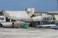 N1187X @ PMP - UH-1 in parts at Pompano Beach Serial 67-17537 - by Florida Metal