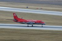 N446XJ @ CID - Landing roll on Runway 27 - by Glenn E. Chatfield