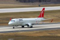 N613CZ @ CID - Taxiing inbound on Alpha from Runway 27 - by Glenn E. Chatfield