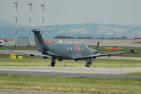 OY-TWO @ EGCC - PC-12  - Parked on Ramp - by David Burrell