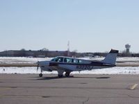 N3220J @ KAXN - Taxiing really fast to it's hangar - by Kreg Anderson