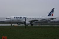 F-GFKR @ EGCC - Taken at Manchester Airport on a typical showery April day - by Steve Staunton