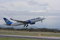G-MLJL @ EGCC - Taken at Manchester Airport on a typical showery April day - by Steve Staunton